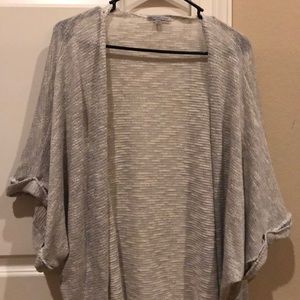 Grey and white speckled sweater